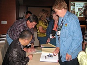 4-15-Prof. Wei signing his book The Gesneriaceae of China