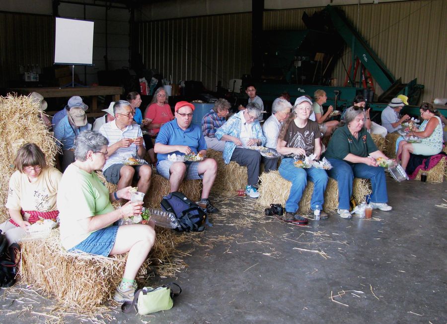 Tour group enjoying a delicious box lunch in the barn