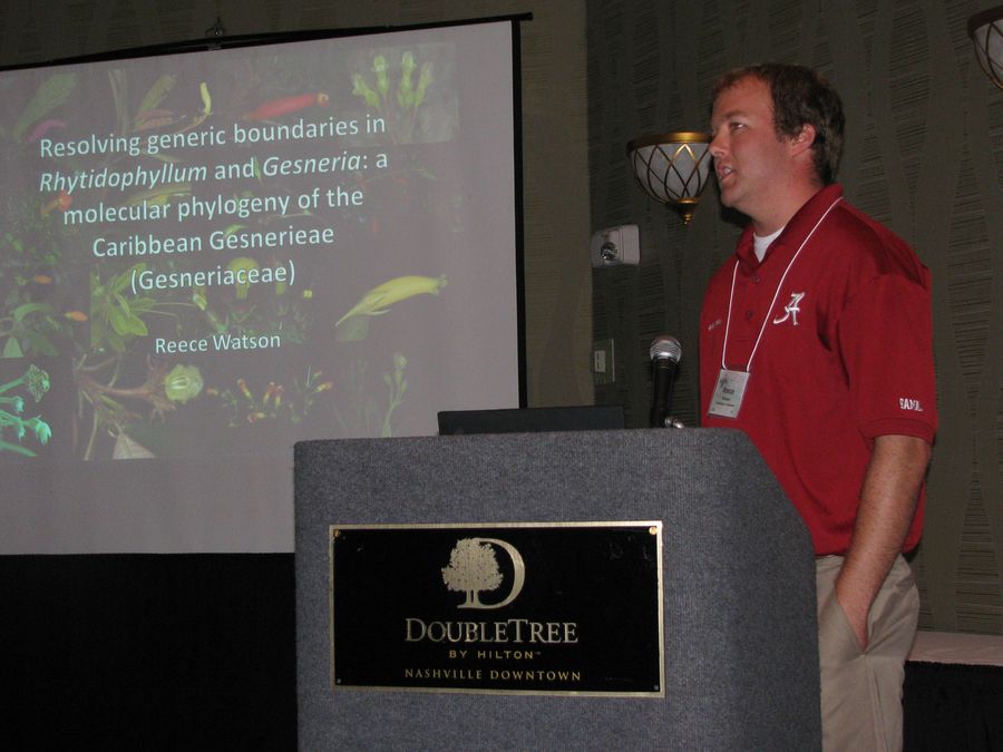 Reece Watson presenting his program on <i>Rhytidophyllum</i> and <i>Gesneria</i>