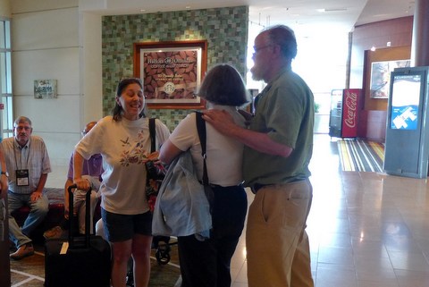 Convention Chair Jo Anne Martinez being greeted upon arrival at the hotel on Sunday